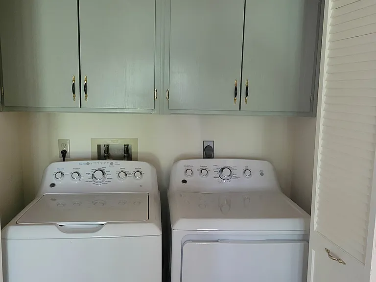 In-unit laundry with high-quality washer and dryer pair and plenty of storage; new flooring and cabinet hardware.