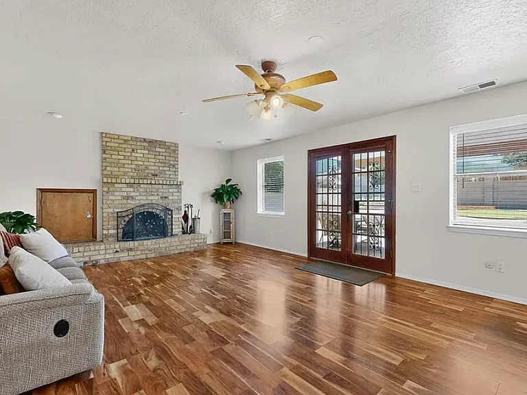 Den w/ Wood Burning Fireplace Before Rebuild 2
