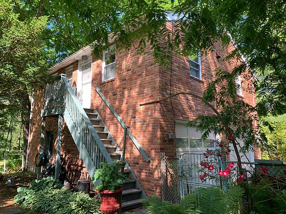 Exterior with stairs to 2d floor.