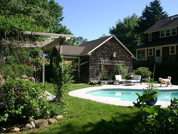 back yard looking at private pool area 
