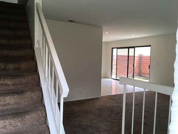 Living room and dining area with patio