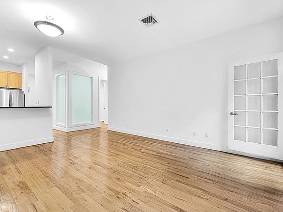 2nd image of 122 E 27th St APT 2B