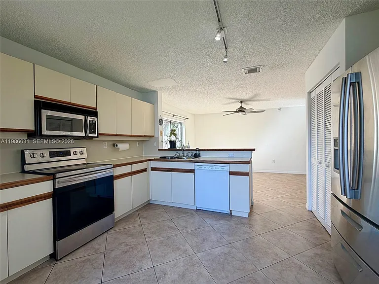 12619 NW 11th Pl — Photo 53