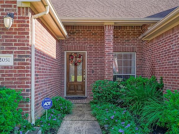 Beautiful front door with a full sprinkler system