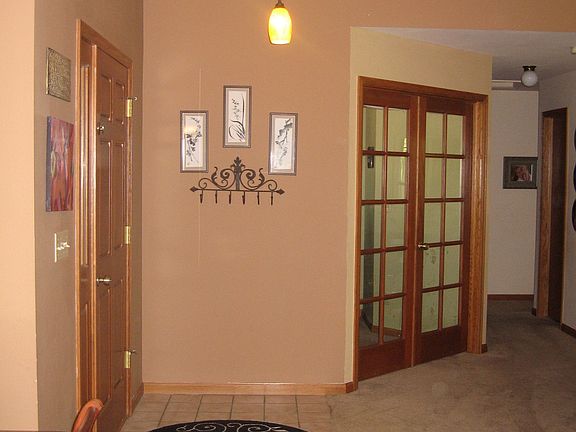 front door, entry way, french doors on the office which is the front window