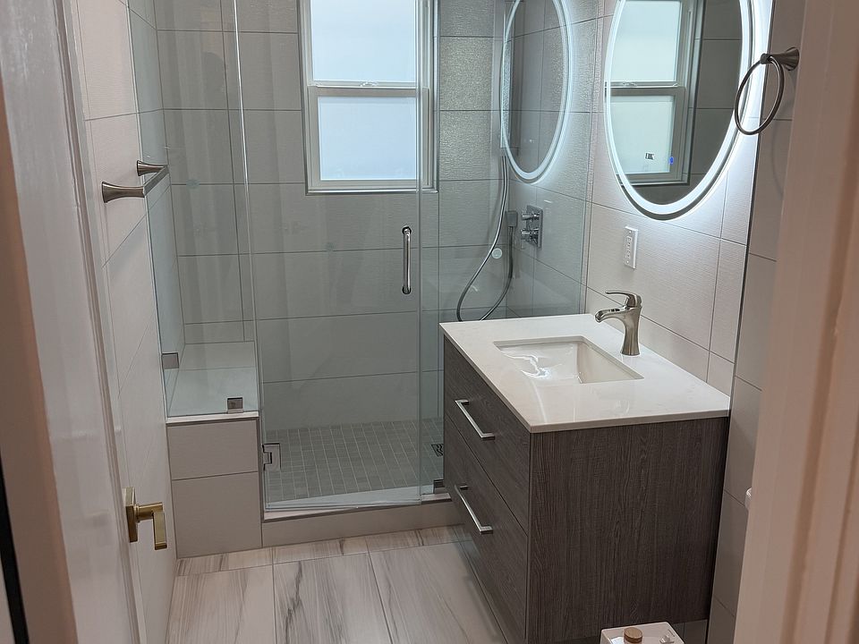Remodeled Bathroom with Modern Finishes.