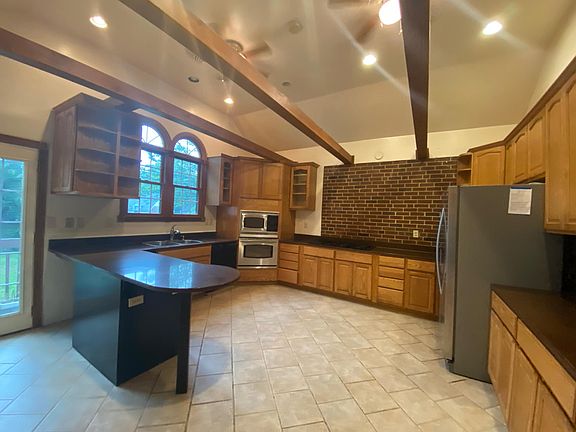 Large Kitchen with Exposed Wooden Beams