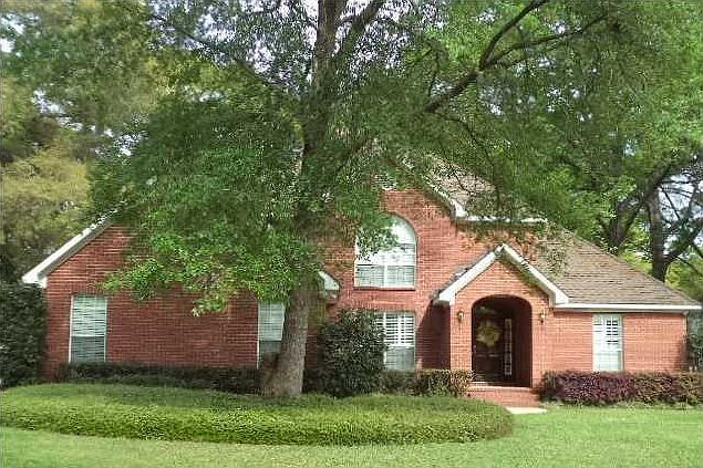Stunning brick home on quiet cul-de-sac with so much curb appeal.