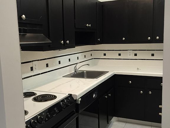 Kitchen (*New Dishwasher) Stove, Fridge