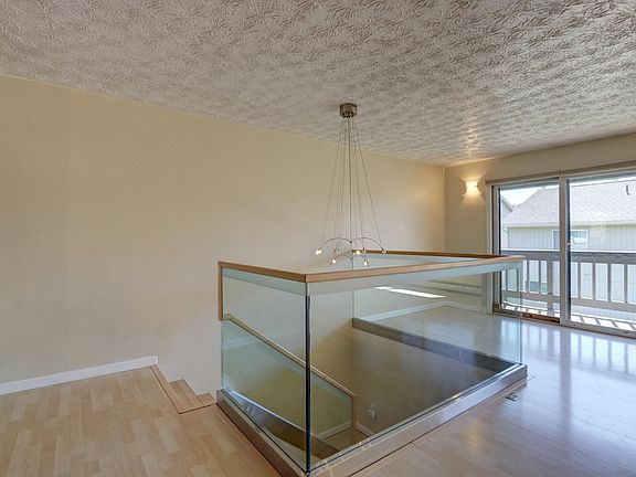 Dining, balcony, stair entry
