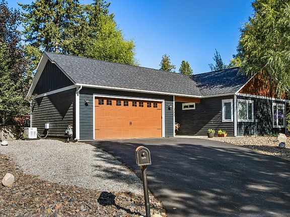 Generator on side of house with parking for your toys.