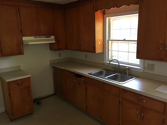 Kitchen with appliances about to be delivered.