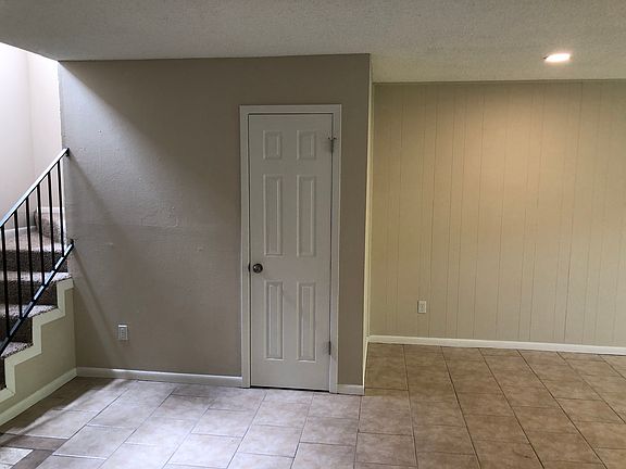 First Floor Living Area with storage closet.