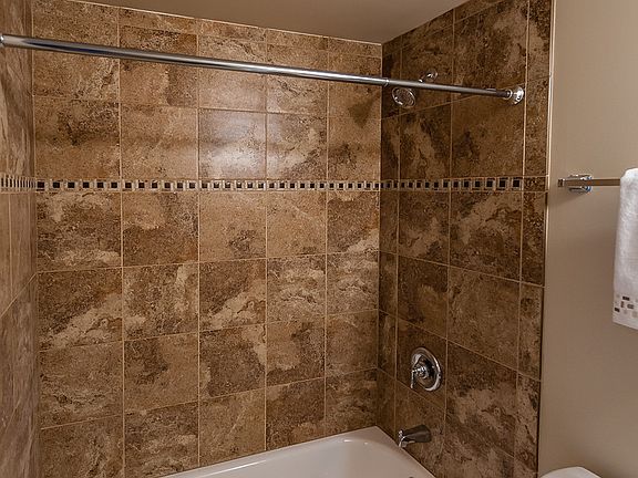 Tub to Ceiling Ceramic Tile