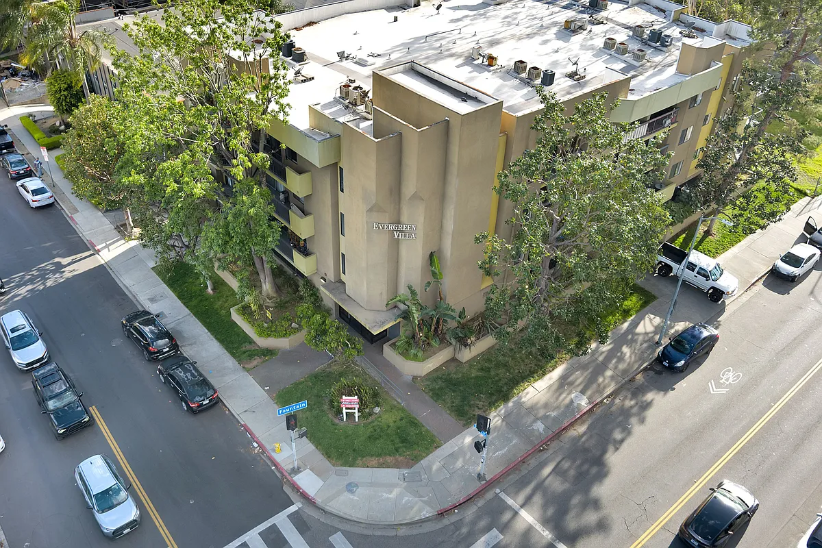 Aerial view of building. Located on the corner of Fountain Ave. & Orange Dr. - Orange Apartments