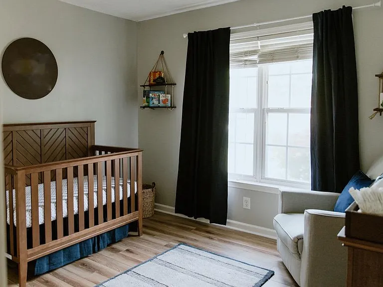 Also light gray walls and wood laminate flooring. Curtain rod for your panels to make the room look just right with your furnishings.
