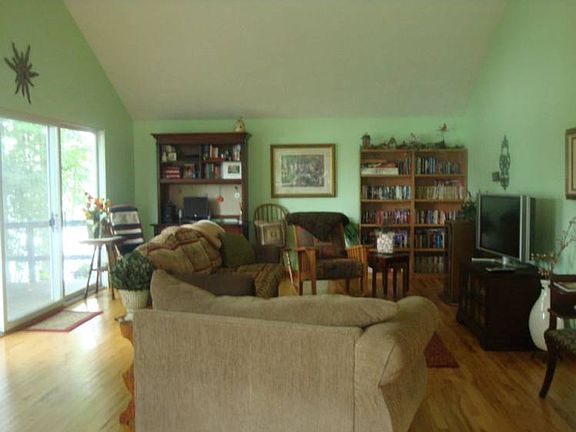 The living room with a beautiful view of the lake