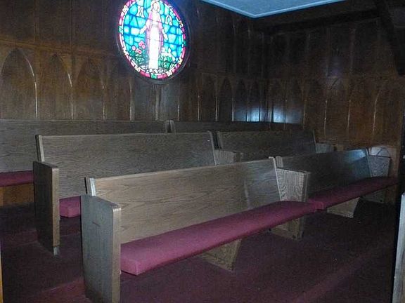 Taditional wood pews.