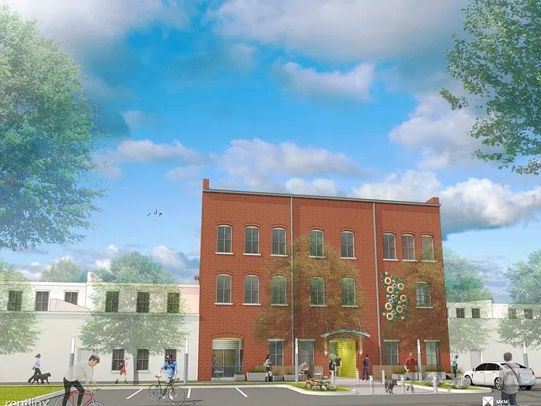 Rear entrance facing 1st Street.