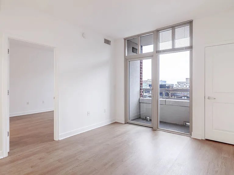 Living Room with Balcony and Hard Surface Flooring