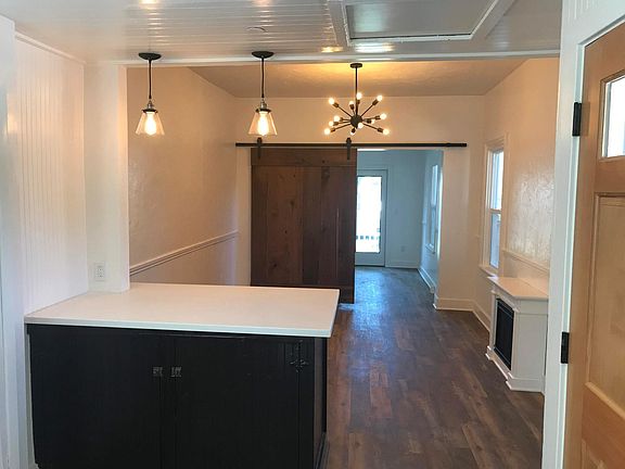 Open floor plan, bedroom in back