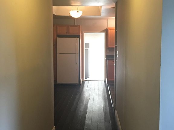 hall separating kitchen and dining area from bedrm, bonus rm, w/d, bathrm
