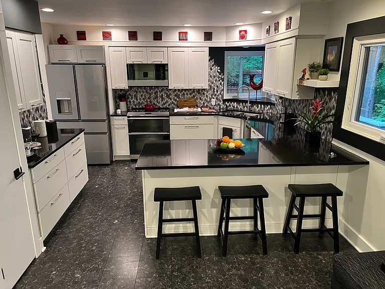 kitchen with peninsula and stools