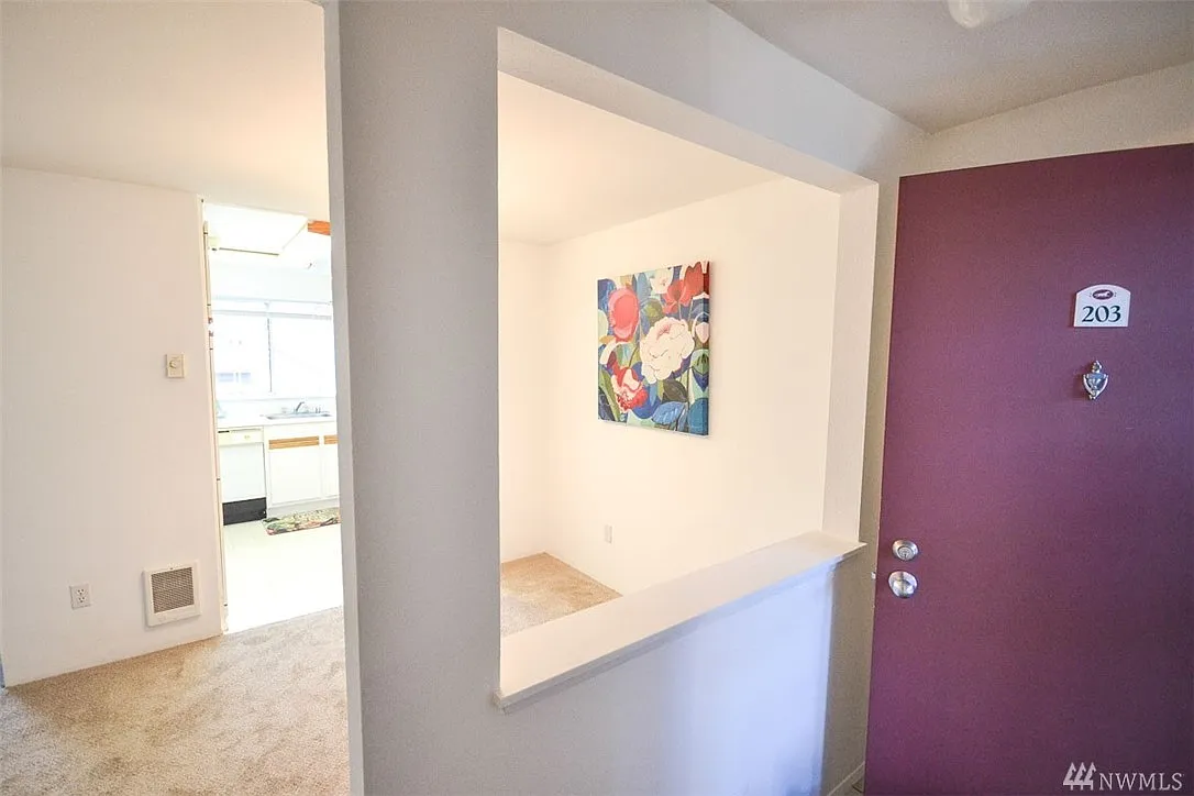 7453 133rd Ave SE #D-203 photo 1