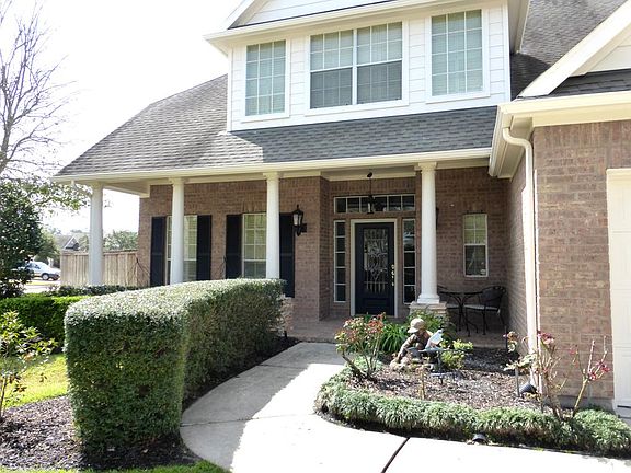 Covered Front Porch with Gas Light Lamps and Leaded Glass Entry