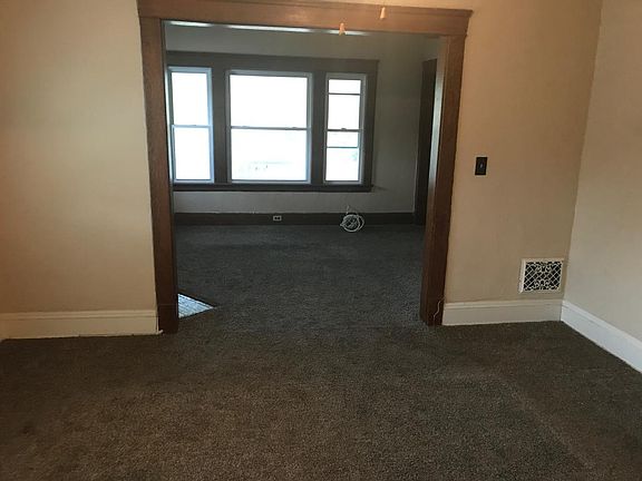 Dining room/living room in distance