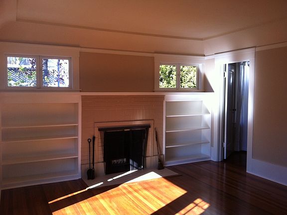 Living Room with Fireplace and built in bookcase