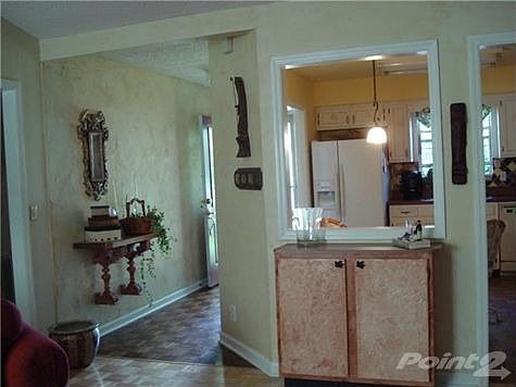 A view of pass thru from great room to kitchen