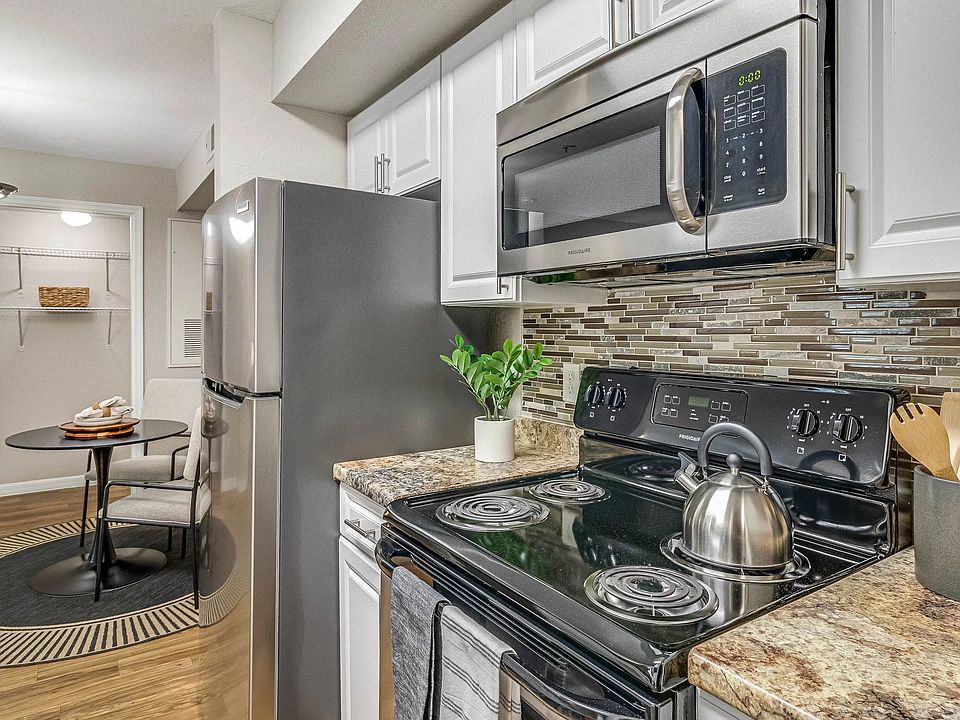 Enjoy our modern kitchens featuring granite-inspired countertops for all your culinary adventures!
