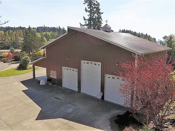 2400 sq ft shop with office space and a bathroom.  Enough space for RV, boats and a couple of vehicles.