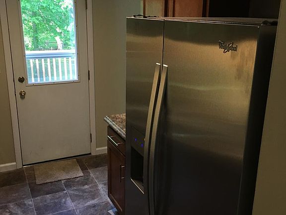 New fridge in galley kitchen