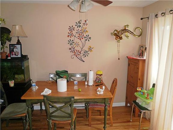 Updated hardwood floors in dining room