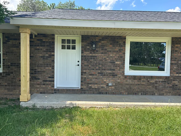 Columns will be stained to match garage door once the wood cures.