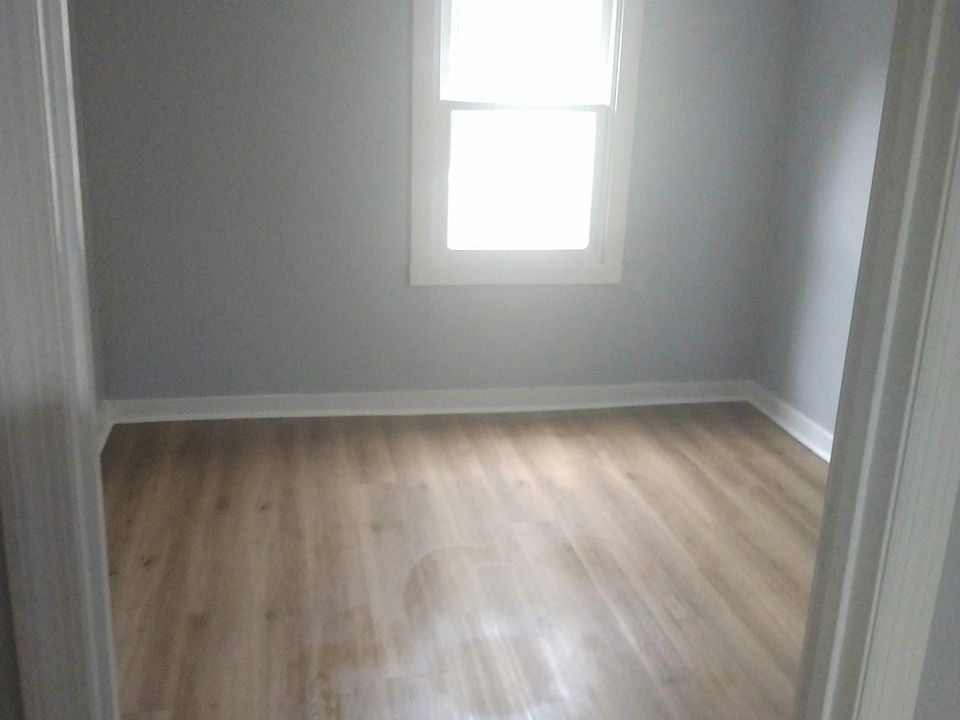 Bedroom with newer flooring