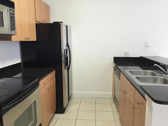 4th image of 1865 Palm Cove Blvd #0