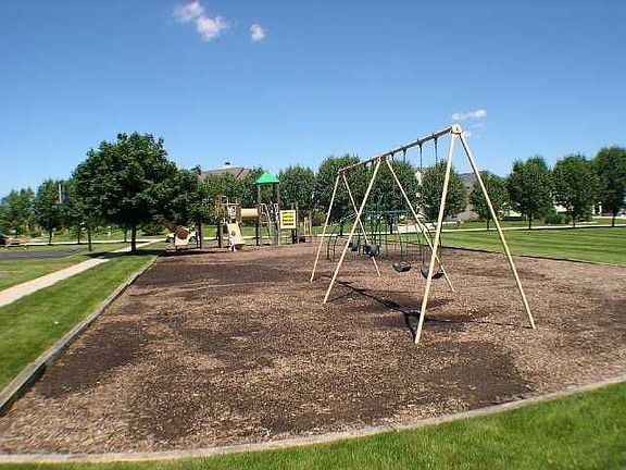 Cambridge offers Residents and their Guests this playground down the street.