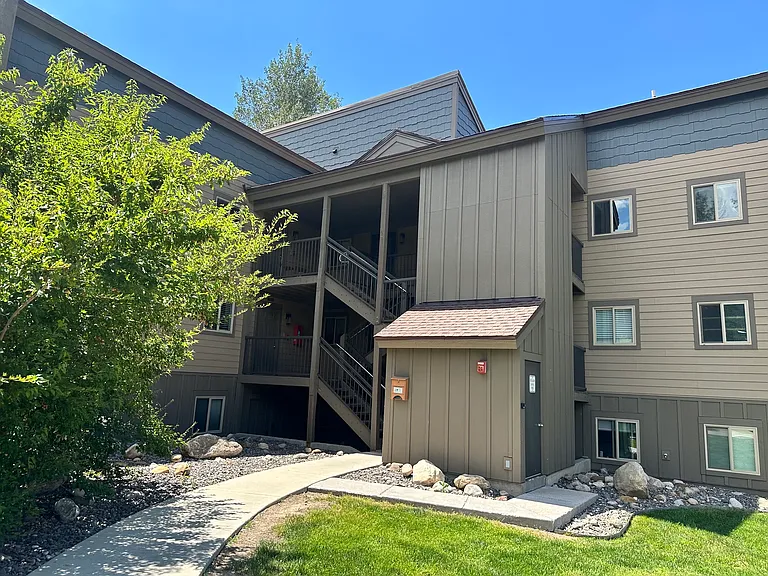 6 stairs up to main floor unit