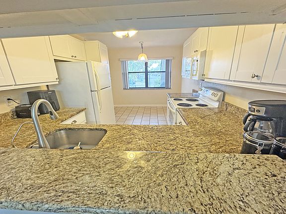 Looking into kitchen from dining area