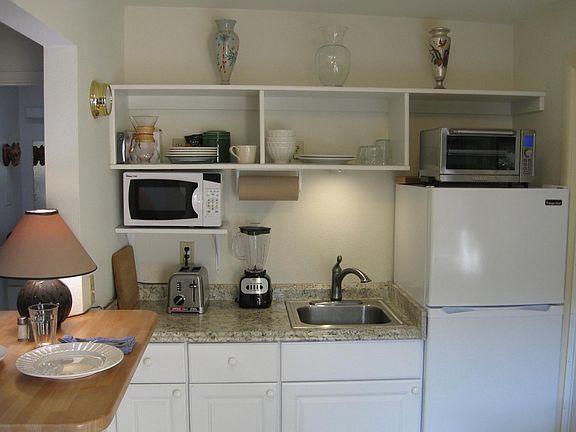 Kitchenette with cook-top, microwave, toaster oven, full size refrigerator and all amenities.