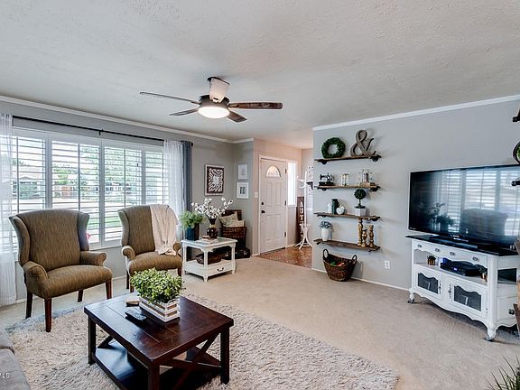 WALL OF GLASS IN LIVING ROOM