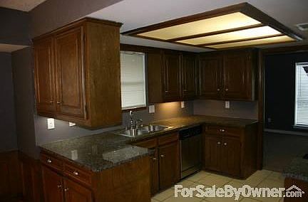 Kitchen with Granite Countertops
						:
						Granite countertops and premium stainless steel appliances.