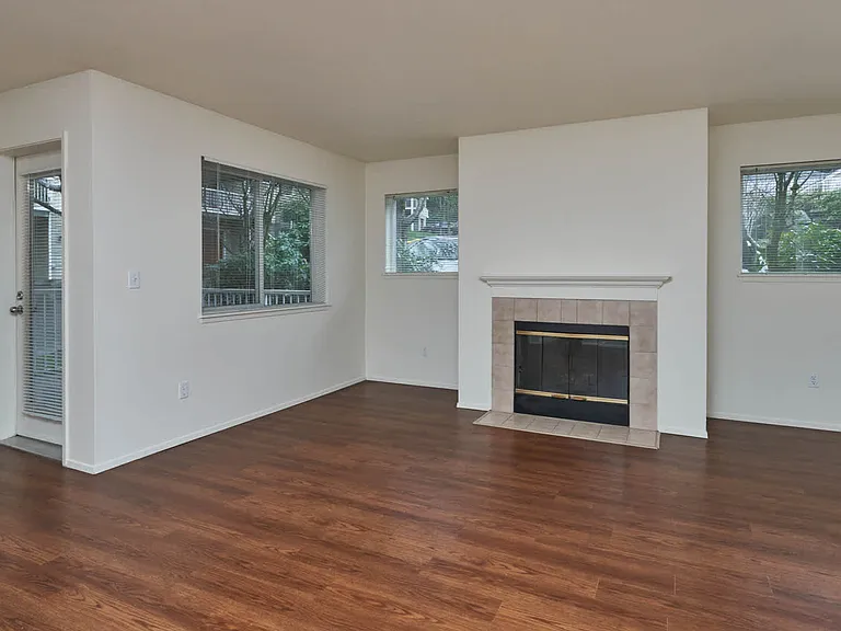 Living Room with Fireplace and Balcony