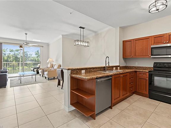 5th image of 10121 Villagio Palms WAY #201