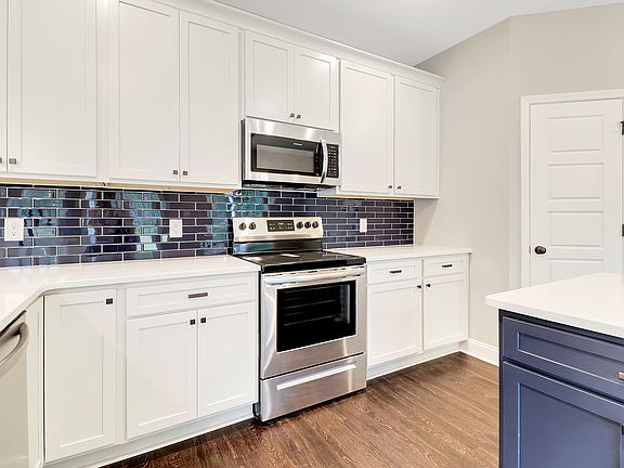 Edisto - Kitchen with Island Ernest Homes