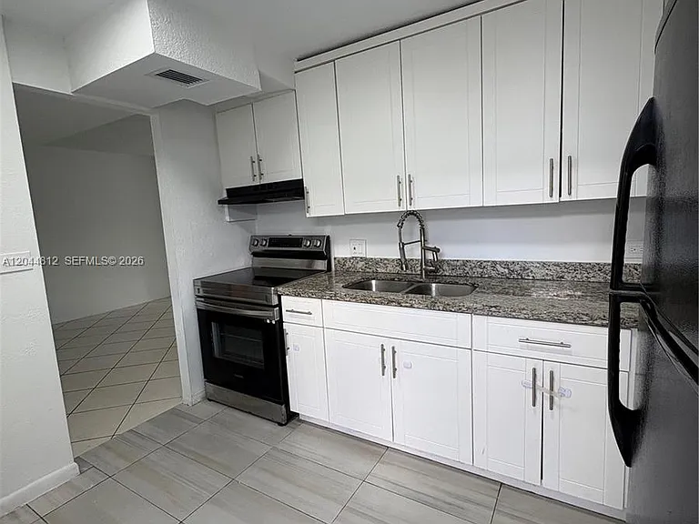 447 NE 195th St #214 — Photo 5