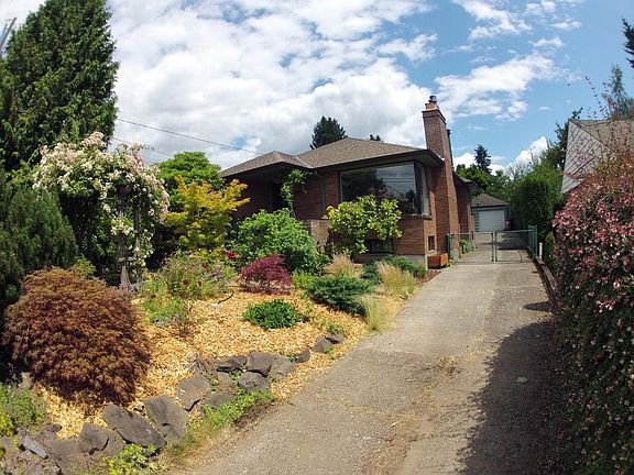 Front of house, showing off-street parking for 5